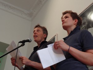 lann and ja´n talking in front of a microphone